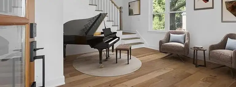 CMD farmhouse foyer with oak flooring and a staircase
